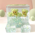 Acrylic liquid wiggler phone stand with mint green twin bears - front view